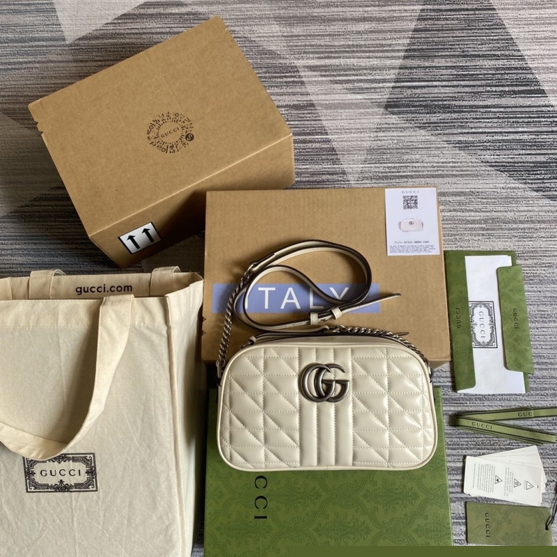 G*u*i satchel bags